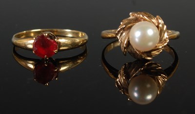 Lot 67 - A 9ct gold and pearl set single stone ring,...