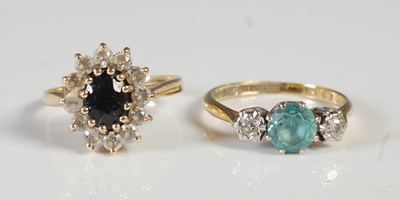 Lot 68 - A 9ct gold and gem set cluster ring, size O,...