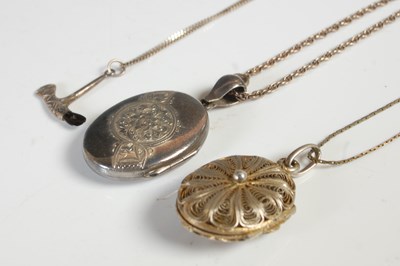 Lot 69 - A Birmingham silver oval shaped locket and...