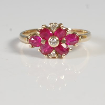 Lot 78 - A yellow metal, synthetic ruby and diamond...