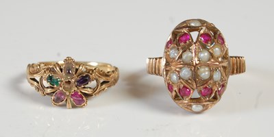 Lot 82 - Two yellow metal gem set dress rings, gross...