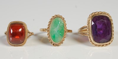 Lot 83 - Three 9ct gold single stone gem set dress...