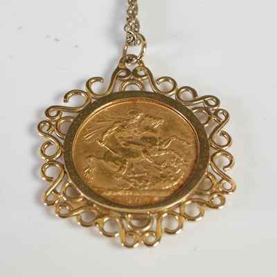 Lot 84 - An Edward VII gold sovereign, in a 9ct gold...