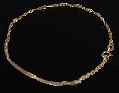 Lot 87 - A yellow metal bracelet, stamped '375', 0.9...