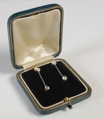 Lot 95 - A pair of yellow and white metal diamond set...
