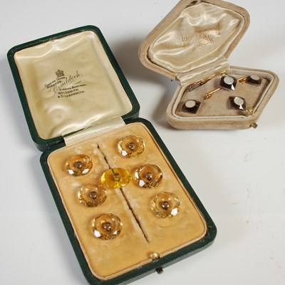 Lot 100 - Two cased sets of vintage shirt studs; one of...