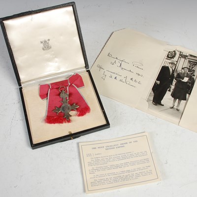 Lot 123 - A cased MBE, with black and white photograph...
