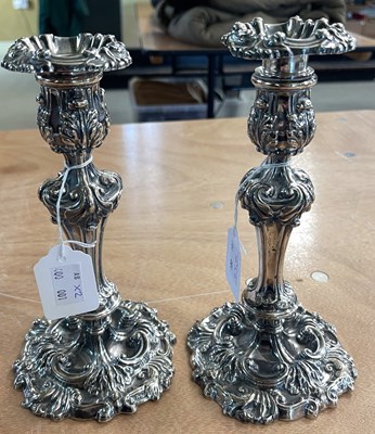 Lot 149A - A pair of Sheffield silver candlesticks with...