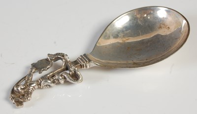 Lot 184 - A Continental silver caddy spoon, the handle...