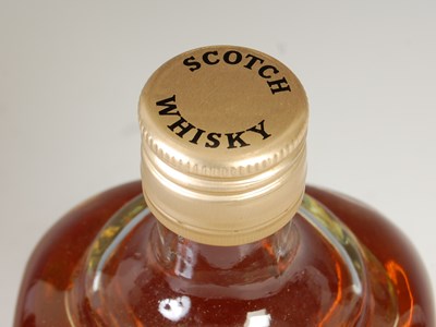 Lot 143 - A boxed bottle of Royal Troon Golf Club finest...