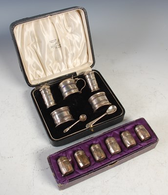 Lot 207 - A cased Birmingham five piece cruet set; and a...
