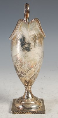 Lot 221 - A George III silver helmet shaped cream jug,...