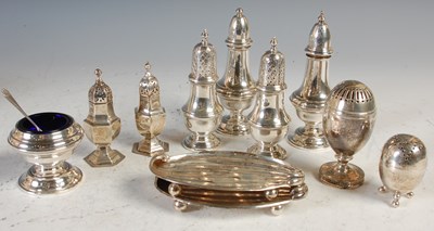 Lot 230 - A collection of silver to include a pair of...