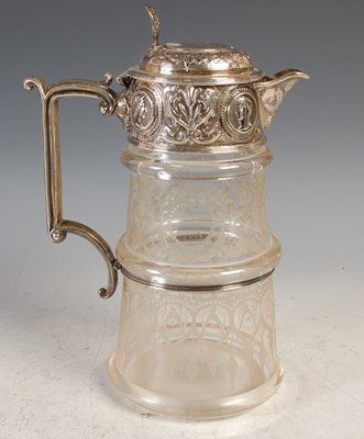 Lot 231 - A Victorian silver mounted glass claret jug,...