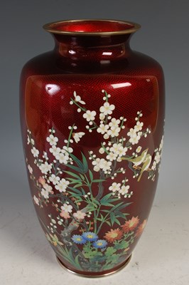Lot 234 - A Japanese Ginbari red ground silver wirework...
