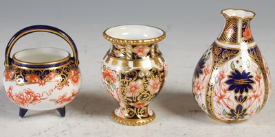 Lot 262 - Three miniature Royal Crown Derby vases.