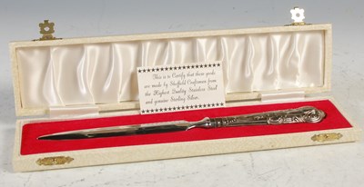 Lot 272 - A silver handled letter opener, in fitted case.