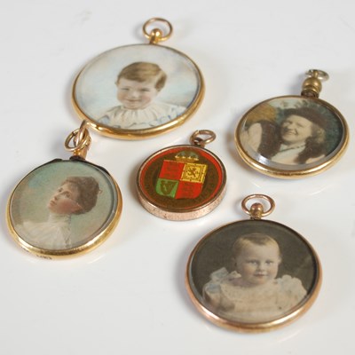 Lot 277 - Five assorted circular shaped yellow metal...