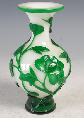 Lot 305 - A Chinese opaque white and green glass...