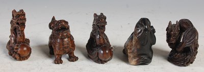 Lot 321 - Five assorted Netsuke, comprising four carved...