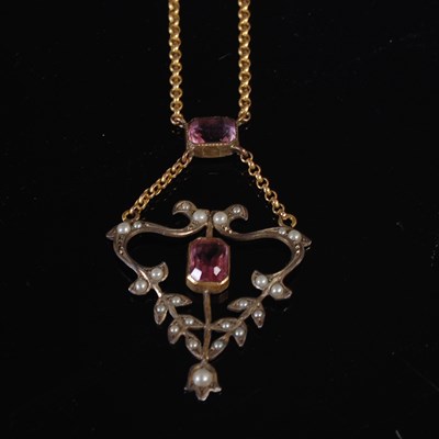 Lot 327 - A yellow and white metal Art Nouveau pendant...