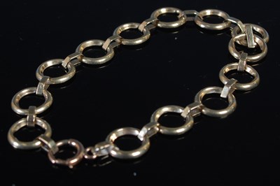 Lot 339 - A yellow metal circular link bracelet, 9 grams.