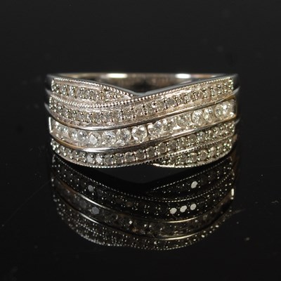 Lot 363 - An 18ct gold and diamond chip dress ring, size...