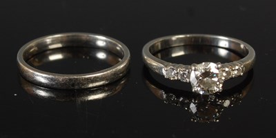 Lot 368 - A platinum and diamond five stone ring, total...