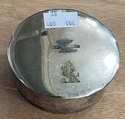 Lot 375 - A white metal circular box with detachable...