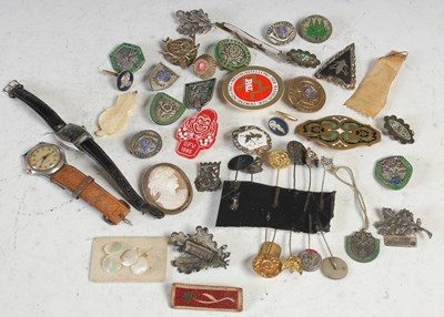 Lot 390 - A box of assorted badges; wristwatches;...
