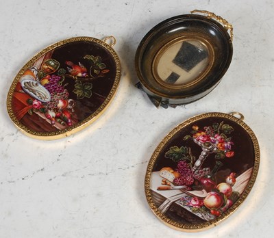 Lot 391 - A pair of gilt metal mounted oval enamel...