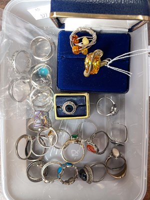 Lot 444 - A box of assorted dress rings.