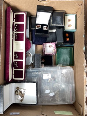 Lot 450 - A box of assorted boxed and loose earrings.