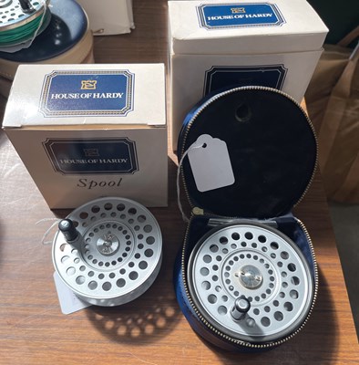 Lot 454 - A boxed House of Hardy fishing reel, the...