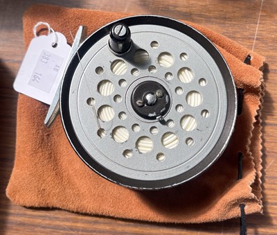 Lot 466 - A Farlow Python fishing reel, in leather bag.