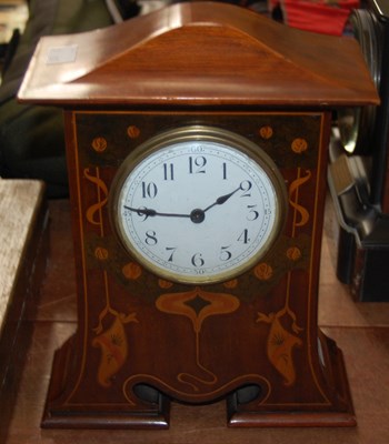 Lot 475 - An Art Nouveau mahogany and penwork mantle...