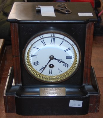 Lot 476 - A late 19th century polished slate mantle...