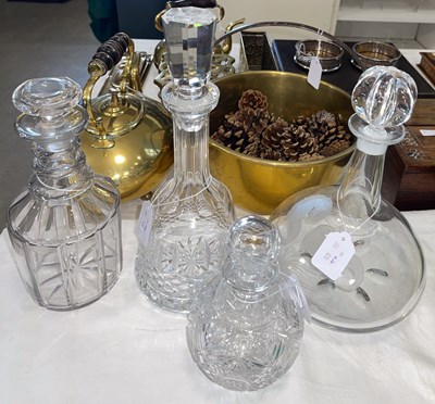 Lot 498 - Four assorted clear glass decanters and stoppers.