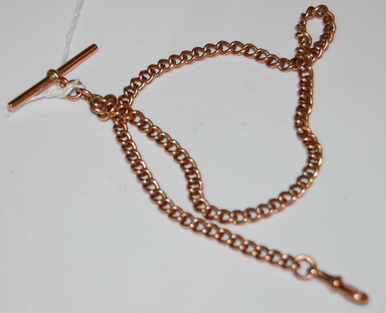 Lot 41 - A 9ct gold Albert chain with T-bar suspension,...