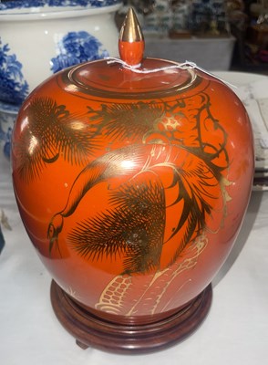 Lot 505 - A Chinese porcelain coral ground jar and cover,...
