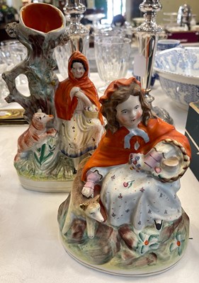 Lot 516 - A Staffordshire pottery spill vase modelled...