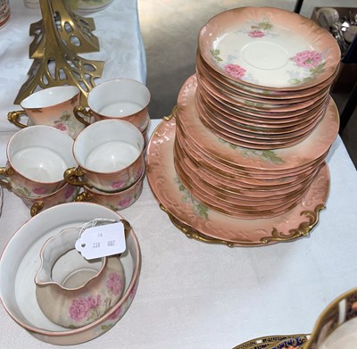 Lot 512 - A Limoges floral decorated part tea set.