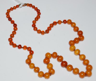 Lot 53 - A vintage butterscotch amber and clear amber...