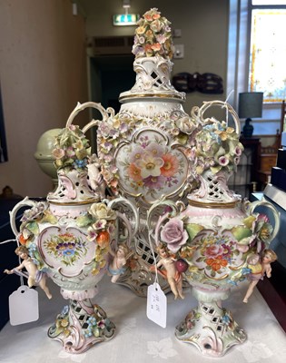 Lot 525 - A garniture of three Dresden porcelain flower...