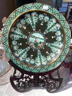 Lot 527 - A Chinese black ground cloisonne charger,...