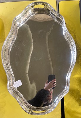 Lot 536 - A large electroplated twin handled serving...