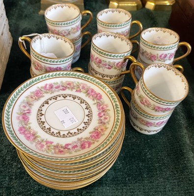 Lot 548 - A French porcelain part coffee set, decorated...