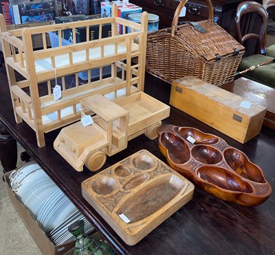 Lot 555 - A collection of wooden ware to include truck;...