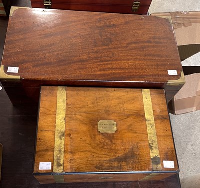 Lot 562 - A walnut and brass bound writing slope, the...
