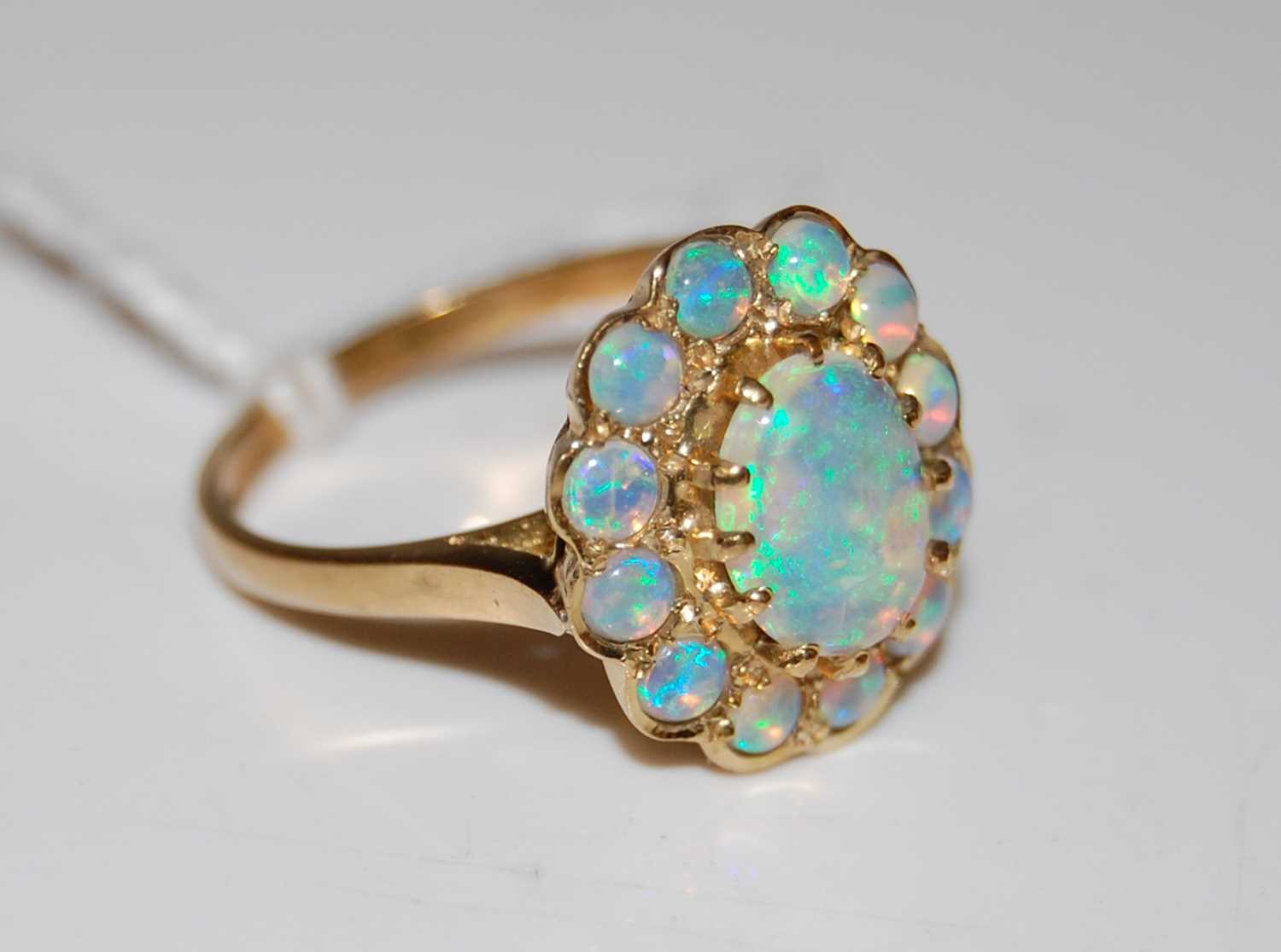 Lot 46 - A 9ct gold opal cluster ring, ring size 'O',...